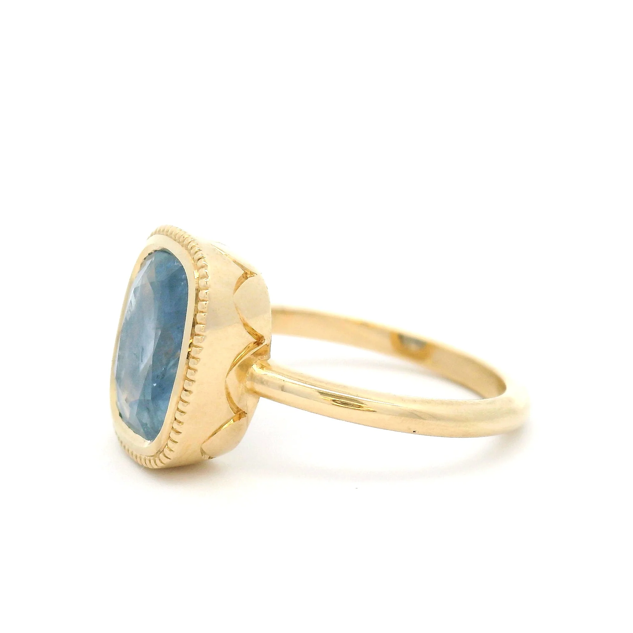 10k Yellow Bezel-Set Solitaire with 3.75ct Cushion-Cut Light Blue Sapphire Accented with Hand-Engraving - Image 3