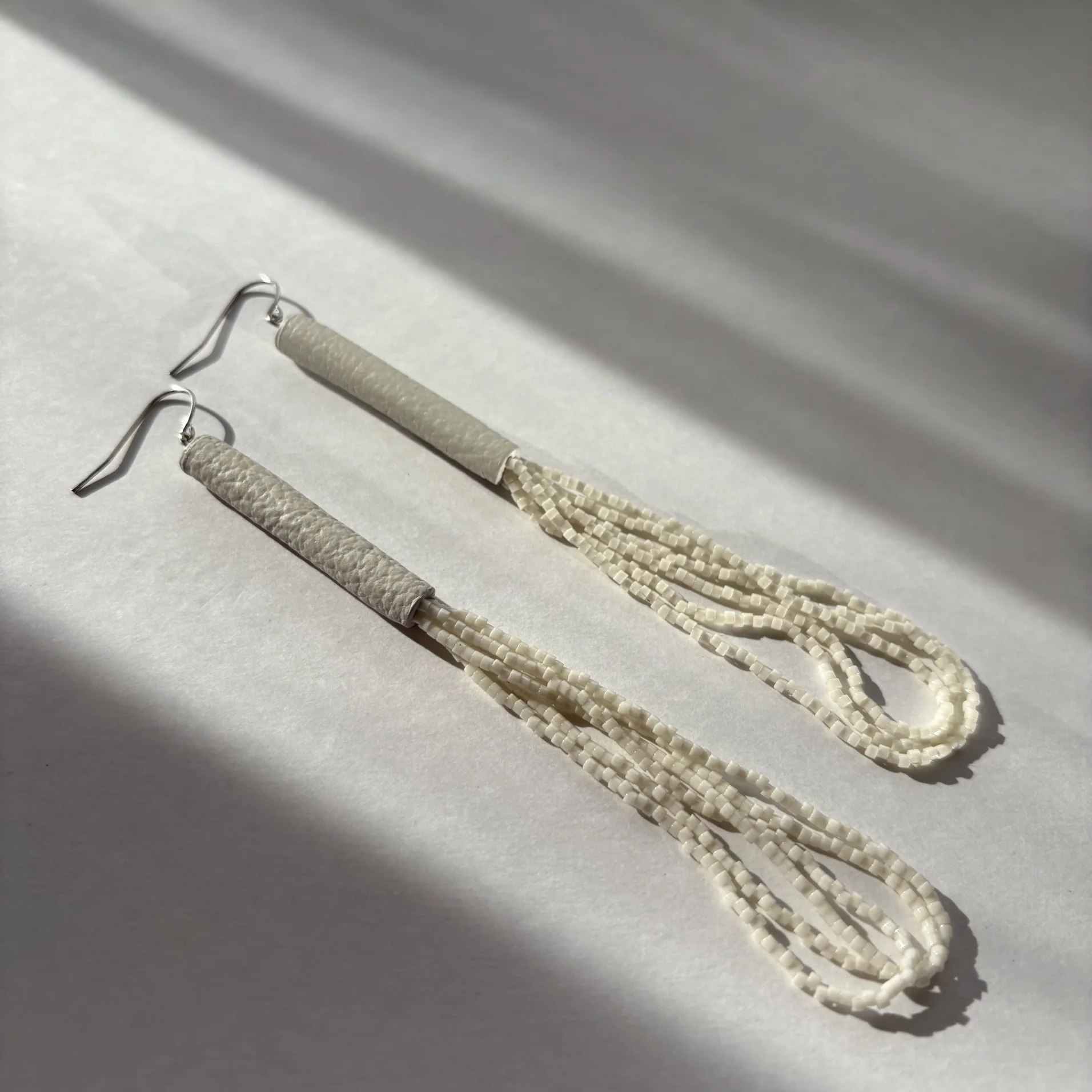 Palea Ivory Beaded Leather Earrings - Image 2