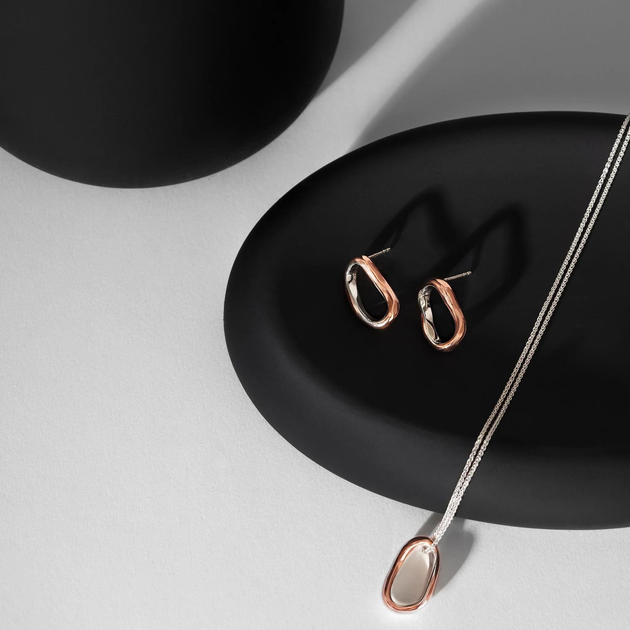 Silver and Copper Curves Pendant - Image 2