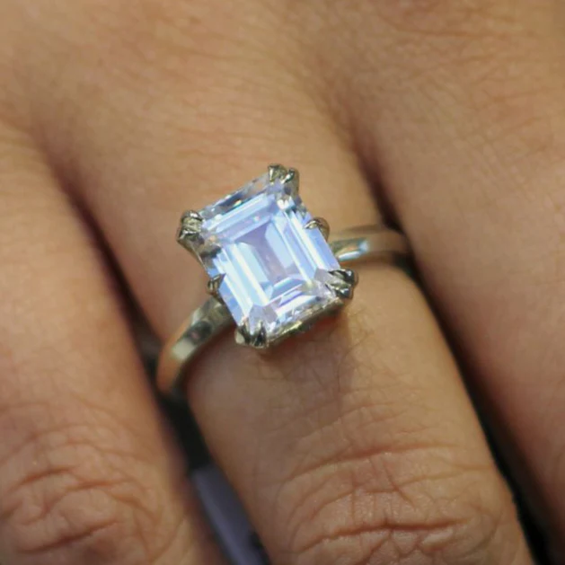 10k White Solitaire with 2.8ct Emerald-Cut White Sapphire and Accent Diamonds - Image 5